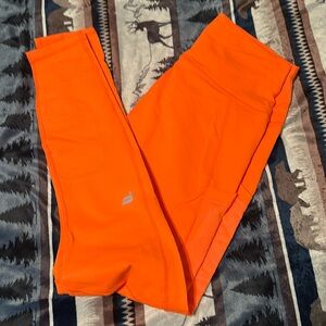 Fabletics medium orange leggings with pockets